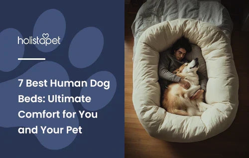 A human laying with a big dog in a human sized dog bed.